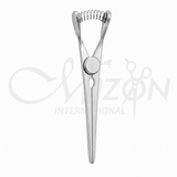 Bulldog Shunt Clamp Angled Titanium 11.5 cm with angled atraumatic jaws for vascular and shunt surgery by Mizon International.