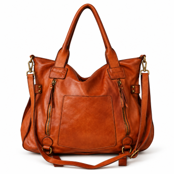 Front view of Mizon International women's cognac-brown genuine leather hobo tote handbag featuring rounded double handles, a long matching strap, central pocket-style panel, two vertical zipper details and antique gold-tone hardware.