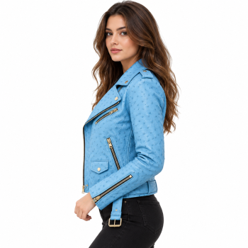 Female model wearing Mizon International women's sky-blue genuine leather biker jacket featuring raised dotted texture, wide notched lapels, asymmetrical gold-tone zipper, belted waist and zippered cuffs against a white background.