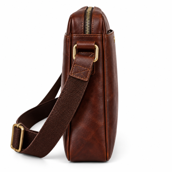 Front view of Mizon International dark brown genuine leather slim messenger bag featuring a rectangular body, top zipper, wide woven-fabric strap, large front panel and circular gold-tone accent.